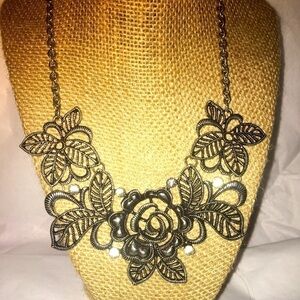 Metal floral statement necklace